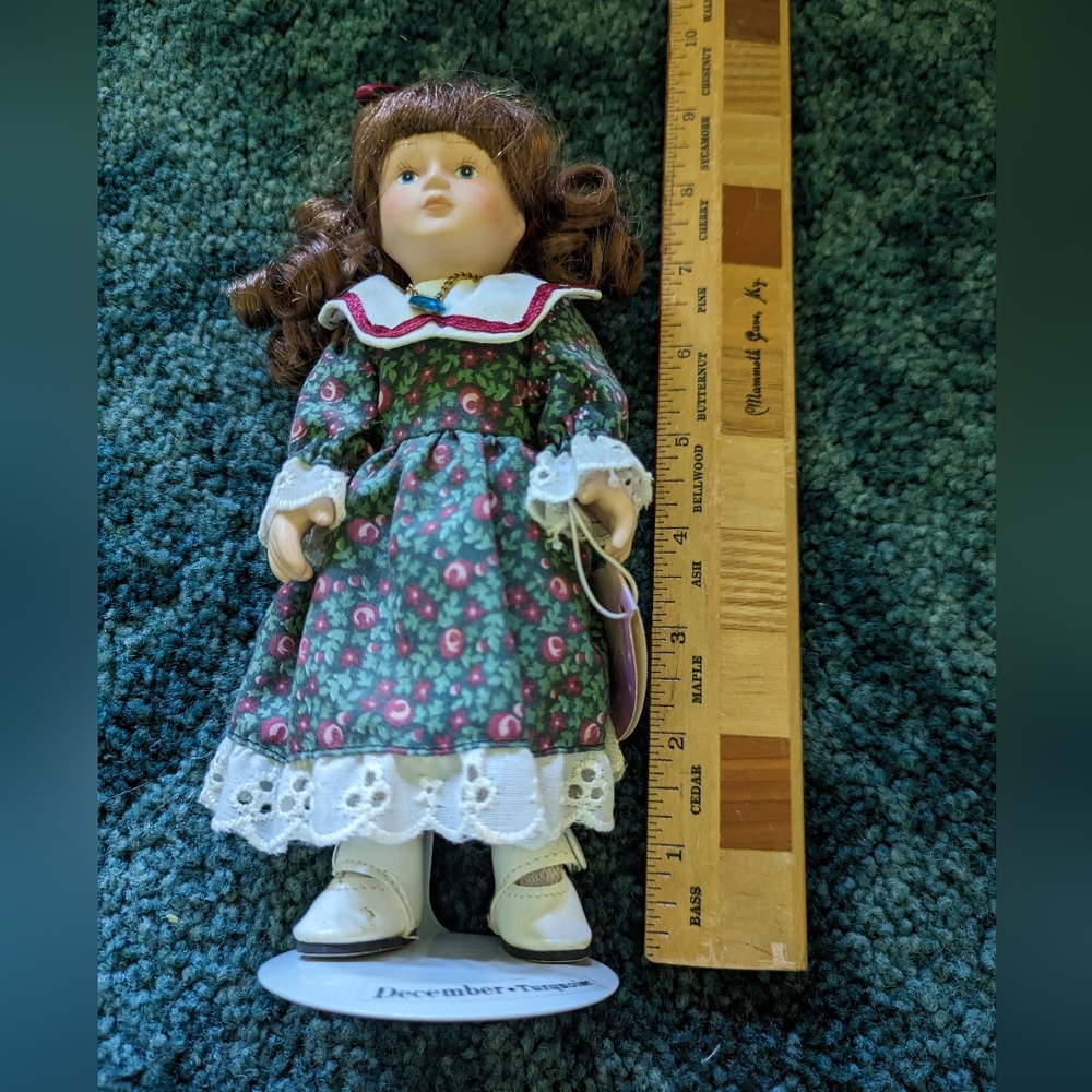 Russ. Vintage mini porcelain doll.birthstone.
